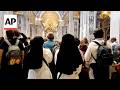 A young nun says goodbye to Pope Francis after hours in line with thousands of faithful