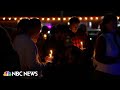 Lewiston residents honor victims of mass shooting during vigil
