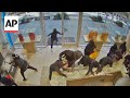 Video shows dozens of masked people robbing a California jewelry store