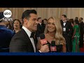 Kelly Ripa and Mark Consuelos walk the red carpet at the Oscars