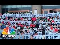 Chinese Security Personnel Clash With Protesters Outside Bank