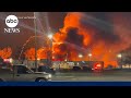 Industrial fire near Detroit sends debris flying