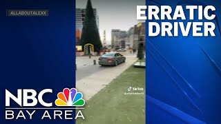 Car drives through Christmas in the Park in San Jose