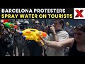 Barcelona Protest LIVE: Protesters Spray Water on Tourists in Barcelona on World Tourism Day | NewsX