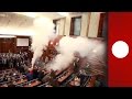 Kosovo Parliament scuffles: opposition use tear gas & pepper spray