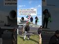 Passengers evacuate off wing of a plane in Georgia