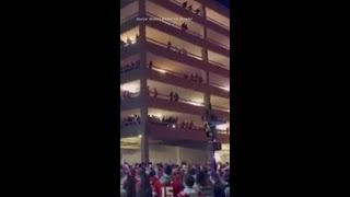 Chiefs Supporters Sing From Parking Garage Following Super Bowl Win