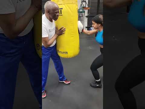 Floyd mayweather giving tips to young amateur lady fighter