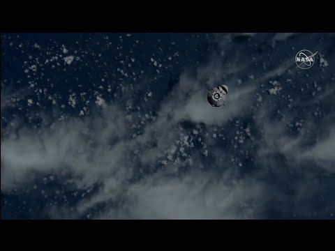 SpaceX CRS-26 Cargo Dragon nears space station in view from space