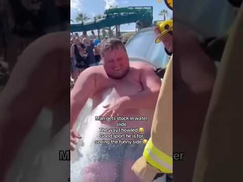 Man gets stuck in water slide 🙈🙈😂😂