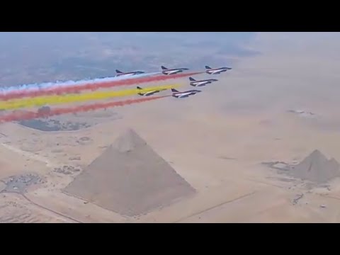 PLA Air Force performs formation flyover at the pyramids