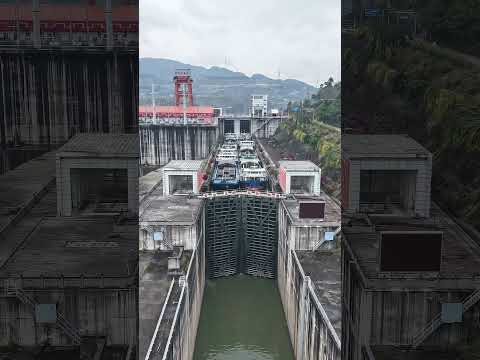 Six Cargo Ships Passing Through the First Navigation Lock on River Cascade Hydropower Station