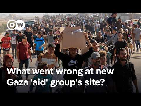 Scenes of chaos: Israeli troops fire shots as crowd scrambles for food at new Gaza aid hub | DW News
