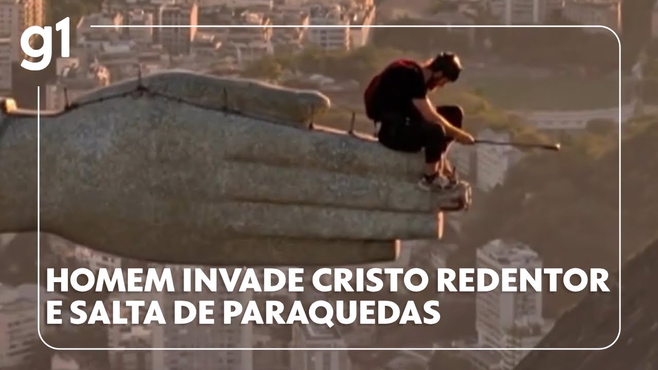 Homem invade o Cristo Redentor e salta de paraquedas da mão do monumento