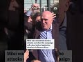 Protesters hurl objects at Argentinas president