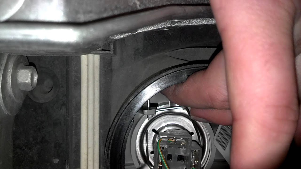 Replace headlamp bulb 2005 ford focus