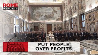 Pope Francis urges businessmen to put people over profits