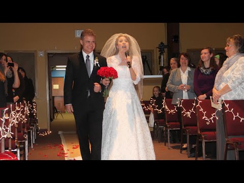 Bride surprises Groom by singing down the aisle. Most incredible wedding ever.