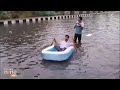 BJP Councillor Ravinder Singh Negi Rows Boat in Waterlogged NH9 Area Amid Heavy Rain in Delhi  - 02:16 min - News - Video