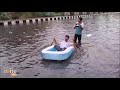 BJP Councillor Ravinder Singh Negi Rows Boat in Waterlogged NH9 Area Amid Heavy Rain in Delhi