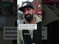 Interview about anti-asylum demonstrations in the UK interrupted by racist abuse  - 01:09 min - News - Video
