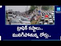 Heavy Traffic Jam Due To Rains In Hyderabad | HYD People Facing Traffic Problems With Rains@SakshiTV