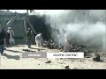 WARNING: GRAPHIC CONTENT - Pakistan blasts kill 26 on eve of election | REUTERS  - 01:30 min - News - Video