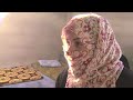 Una madre siria con sus hijos