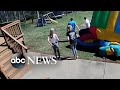 Strong winds sweep bounce house into the air
