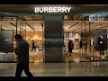 Burberry hit by slowdown in luxury spending