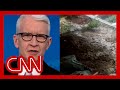 Anderson Cooper speaks with woman whose home was destroyed by towering mud piles