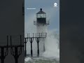 Huge waves crash into Michigan lighthouse
