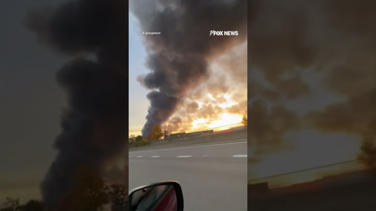 WATCH: Billowing smoke can be seen for miles after a UPS plane crashes #ups #shorts #plane #crash