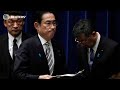 Japan PM purges cabinet after scandal | Reuters