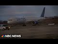 7 people hurt on United flight after turbulence, high winds