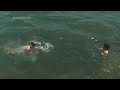 Turks cool off during unseasonable heat on banks of Bosporus - 01:04 min - News - Video