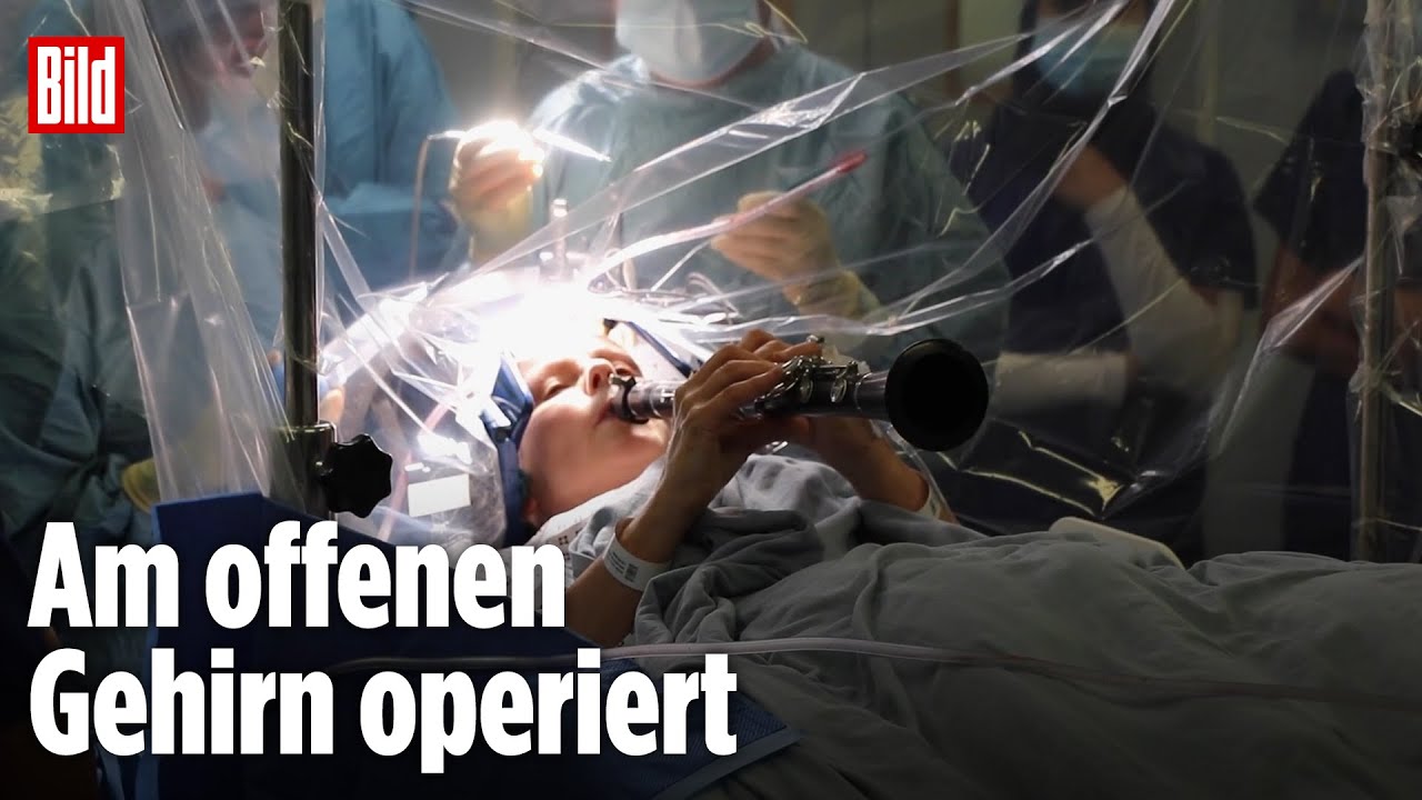 London, England: Patientin spielt Klarinette im OP