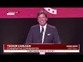 Tucker Carlson calls Charlie Kirk a Christian evangelist during memorial  - 05:55 min - News - Video