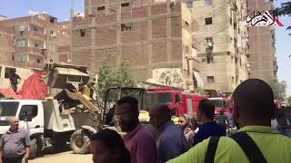 إزالة المخلفات بعد السيطرة على حريق كنيسة أبو سيفين بإمبابة