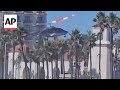 Helicopter loses control and crashes in Huntington Beach, California