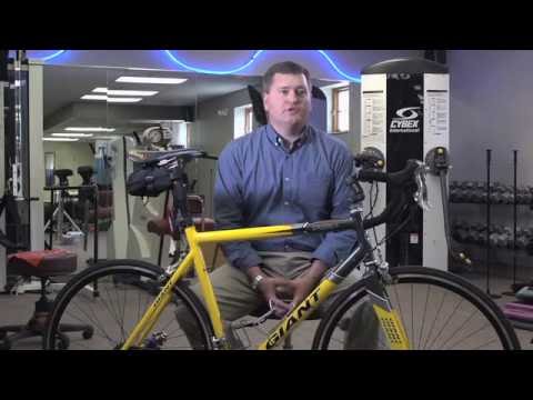 What are some common injuries that could occur from an improperly fitted bike? 