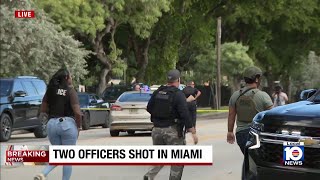 Male, female officers shot in legs in Miami