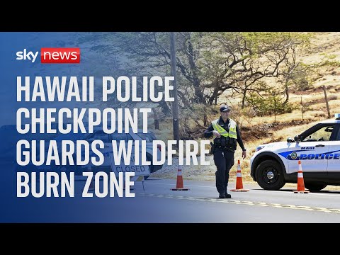 Hawaii police set up a highway checkpoint near deadly wildfires