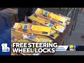 Baltimore City leaders hand out steering wheel locks
