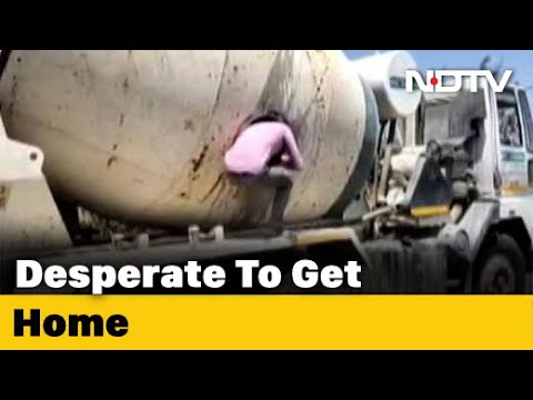 Migrants travelling by hiding in cement concrete mixer held Migrants travelling by hiding in cement concrete mixer held