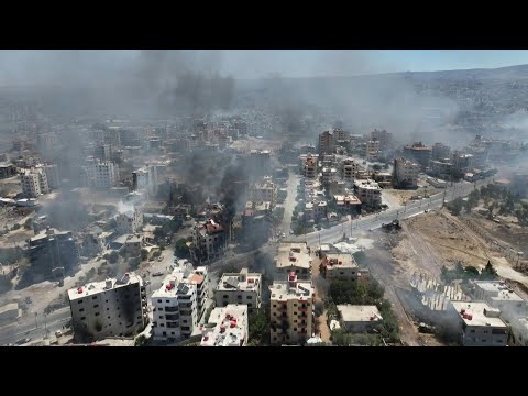 AERIAL SHOTS: Smoke rises over Syria's Sweida as tribal fighters deploy | AFP