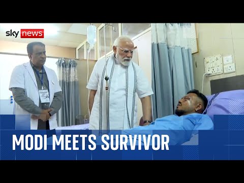 India's PM meets lone survivor and visits plane crash site