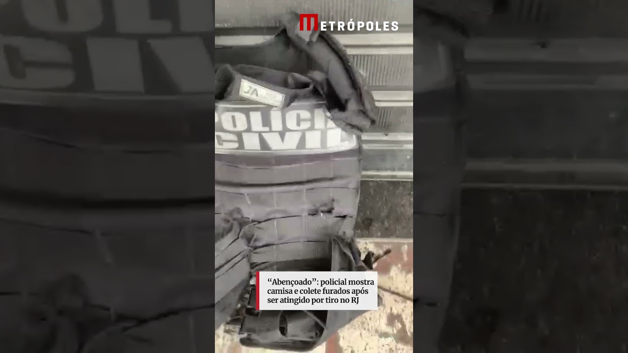 Abençoado policial mostra camisa e colete furados após ser atingido por tiro no RJ