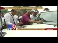 Watch : YCP Parthasarathy wipes Police Boots, Cars against House Arrest