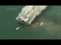 Coast Guard and fire crews battle fire on California pier  - 01:03 min - News - Video
